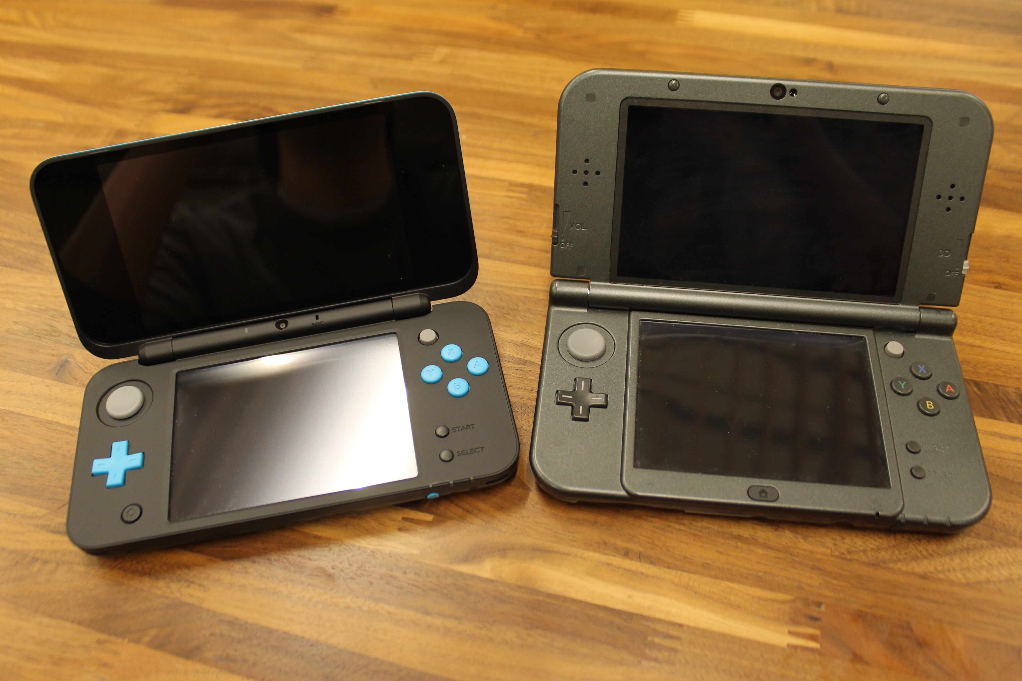 The New 2DS XL alongside the New 3DS XL. 