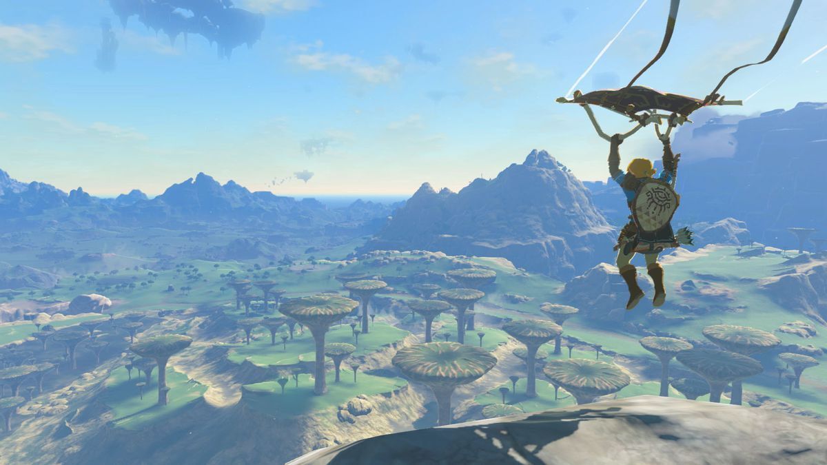 Link soars through the sky on his glider in Tears of the Kingdom.