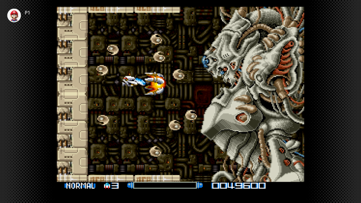 Facing off against an imposing robot in Super R-Type