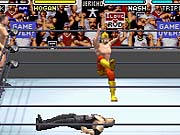 Hogan performs a leg drop with The Rock in his corner. It's the WWE all right.