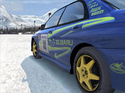 A pretty blue Subaru grapples with the slippery surfaces of an ice-encrusted rally circuit.