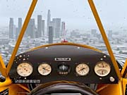 One of Flight Simulator's new arrivals, a tiny Piper Cub, struggles valiantly through a stormy, windy LA morning.