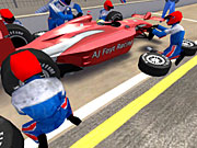 An attentive and fully animated IndyCar Series pit crew goes to work on the team car.
