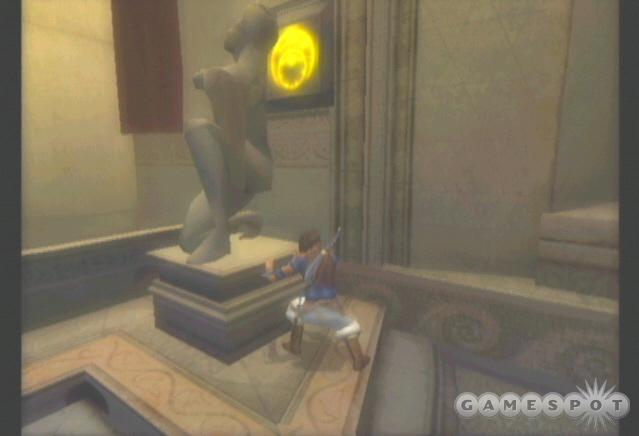 You can use this statue to depress the button on the wall.