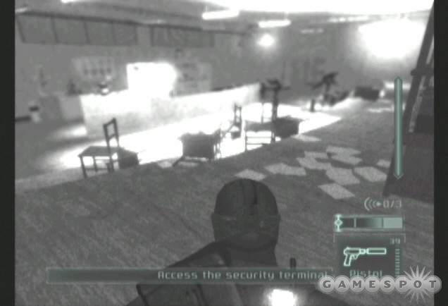 Crouch in the shadow of the back right corner of the auditorium and wait for the enemies to conclude their search.