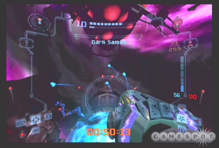Grab these bits of Phazon with your charge beam and fire them back at Dark Samus to finish her off!