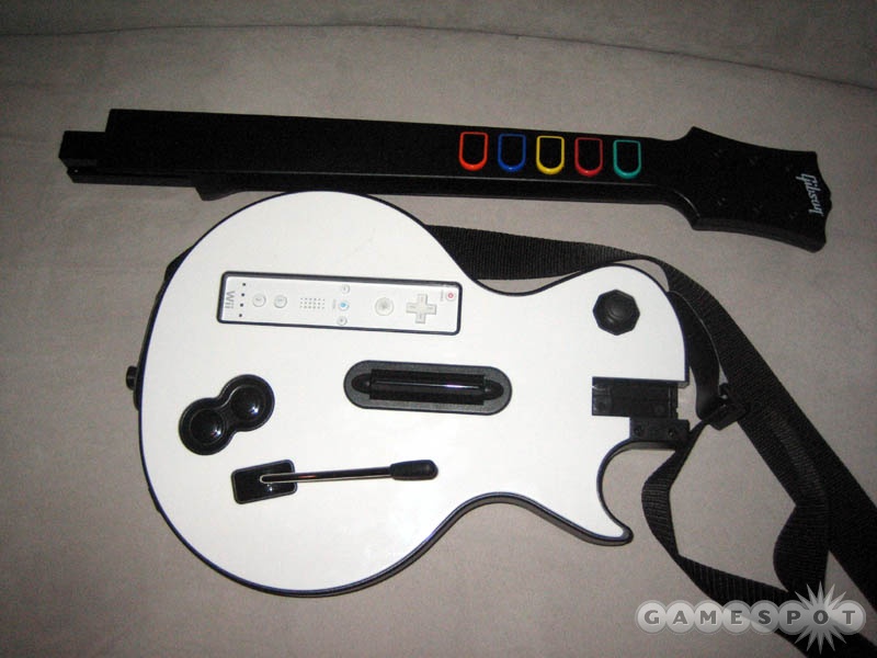 The guitar faceplates will be interchangeable on the Xbox 360 and the PlayStation 3 controllers, but not on the Wii for obvious reasons.
