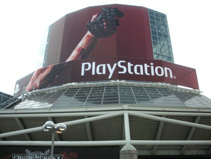 </img>    </img>    </img>    The biggest ad by far is for Assassin's Creed 2, stretching almost the entire length of the LACC's front:    </img>    </p>  Inside, Sony not-so-subtly touted the old PSP--not the PSP Go--with some Kratos-brawny arms tattooed with the PlayStation family's emblematic square-circle-triangle-X button motif. Sackboy is also on hand inside a PSP, teasing Little Big Planet's imminent arrival on the portable:    </img>    </img>    </img>    </p>  The Concourse Level was invaded by banners for Activision and Infinity Ward's Modern Warfare 2, due out on November 10:    </img>    </img>    </img>    </p>  The first thing that attendees will see when they walk into the LACC West Hall doors are two Bethesda games, Rogue Warrior and Wet:    </img>    </img>    </p>  In the South Hall, Electronic Arts is touting Mass Effect 2, Battlefield: Bad Company 2, and the three-way reboot of the Need for Speed Franchise:    </img>    </img>    </img>    </p>  Last but not least, Square Enix's Final Fantasy XIII loomed large over the South Hall entrance, its distant 2010 launch date taunting impatient JRPG fans:    </img>    
