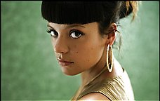 Lily Allen--irresistable in any language.