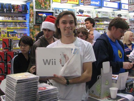 Matt Wendon of Forestville, Sydney, was the first customer to buy a Wii at EB Games Chatswood.