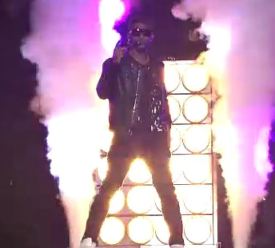 Usher onstage promoting Dance Central 3.