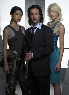 Galactica stars Grace Park, James Callis, and Tricia Helfer.