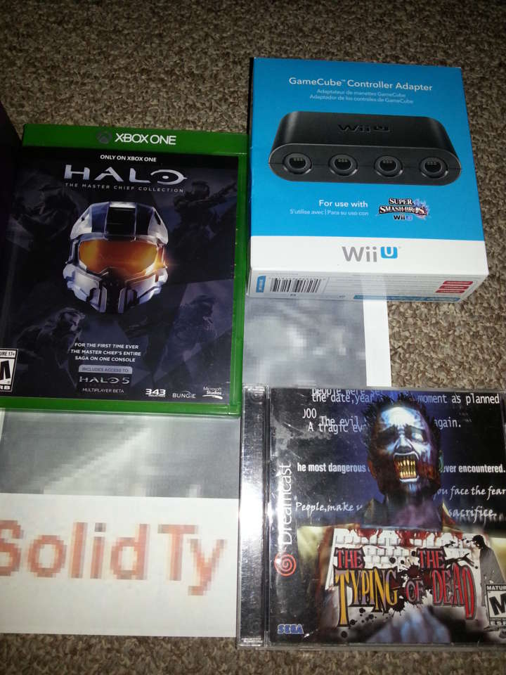 My copy of Halo MCC along with my Wii U Gamecube Controller Adapter and Typing of the Dead for Dreamcast JUST 'CAUSE!!!!!