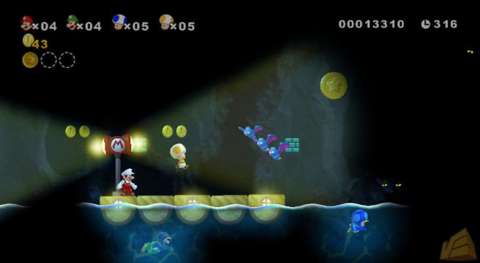 Controlling the spotlight with the Wii remote on top of the classic platforming works amazingly well.