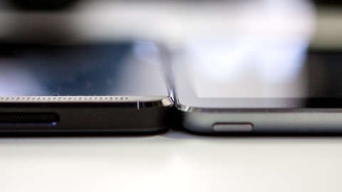 Nvidia Shield (left) next to an iPad Mini (right).