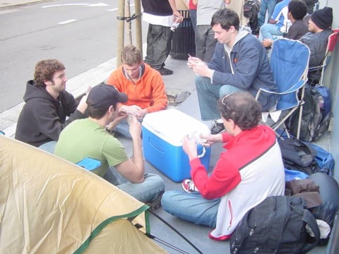 With tent, cards, and cooler, these UCSF grad students wait out the night in relative comfort.