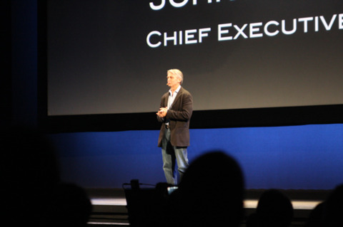 John Riccitiello welcomes the audience to EA's 2009 media briefing.