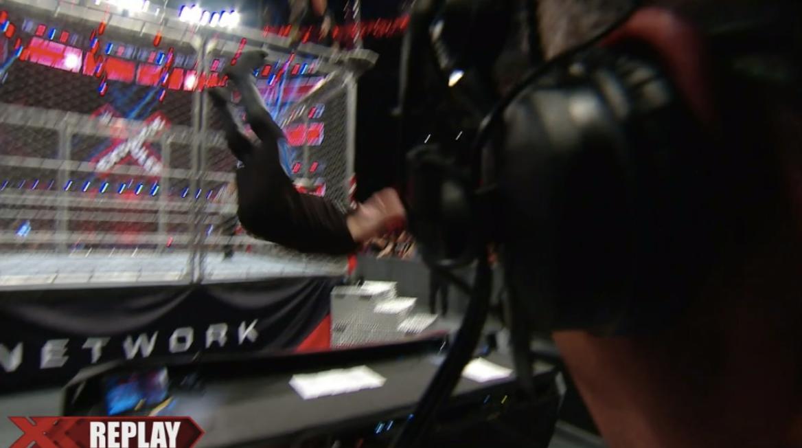 Kevin Owens Goes Through A Table, From The Top Of The Cage