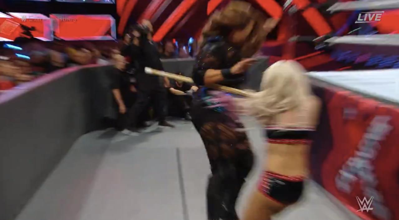 Alexa Bliss Hits Nia Jax With A Kendo Stick
