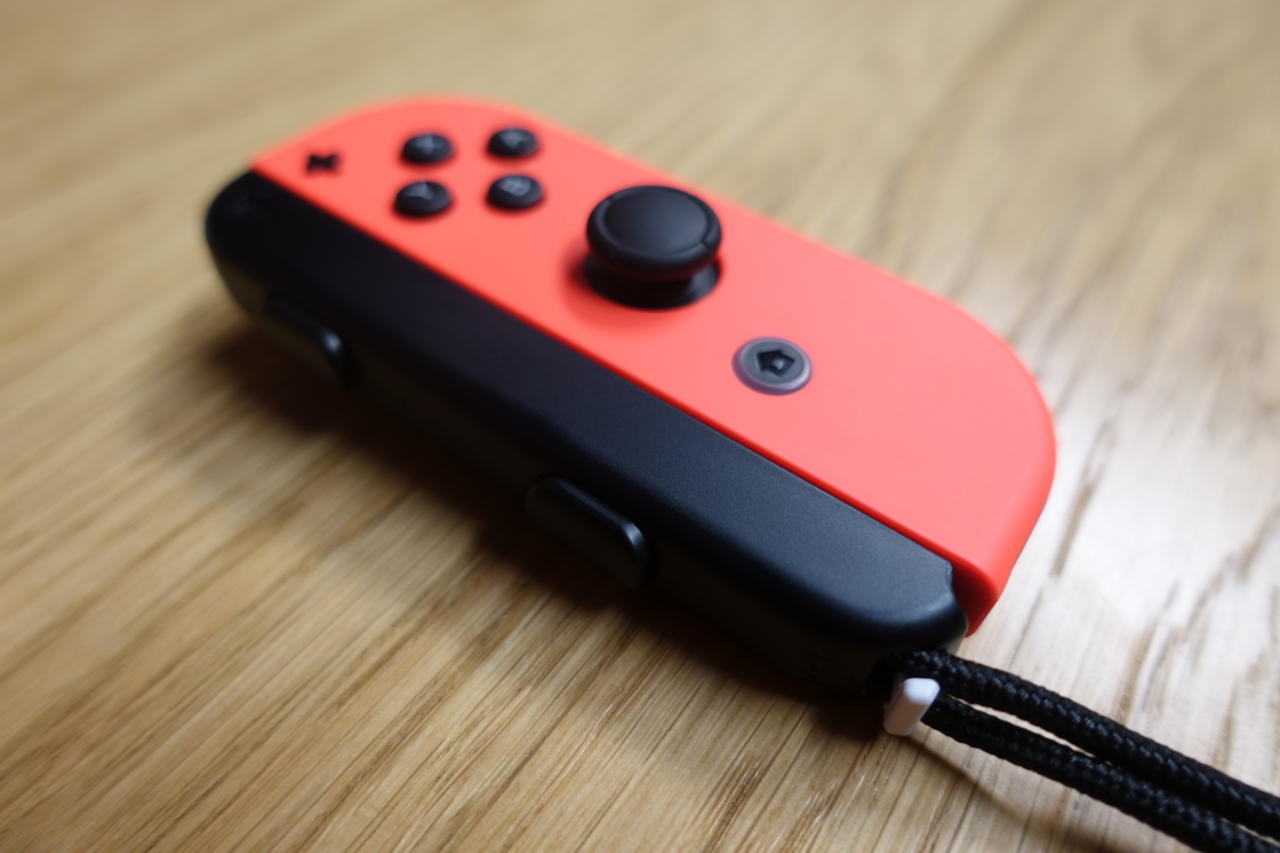 The home button on the right Joy-Con will light up for notifications.