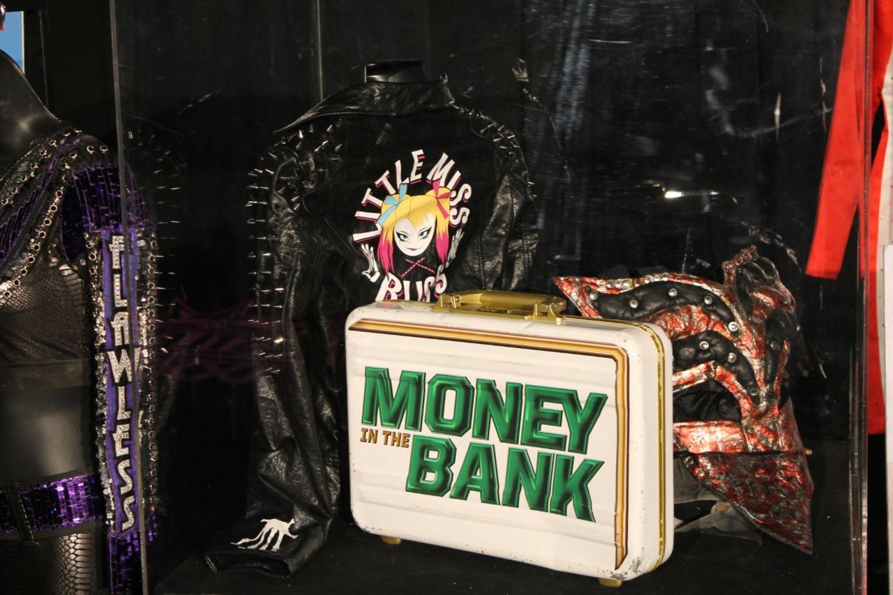 49. Alexa Bliss's jacket and Money In the Bank briefcase