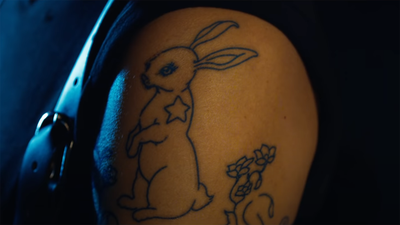 The woman with the rabbit tattoo