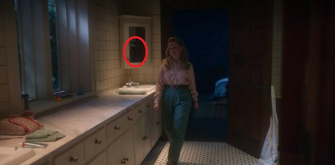 8.) Episode 1, 27:56, in the bathroom mirror as Dani walks into Flora's room