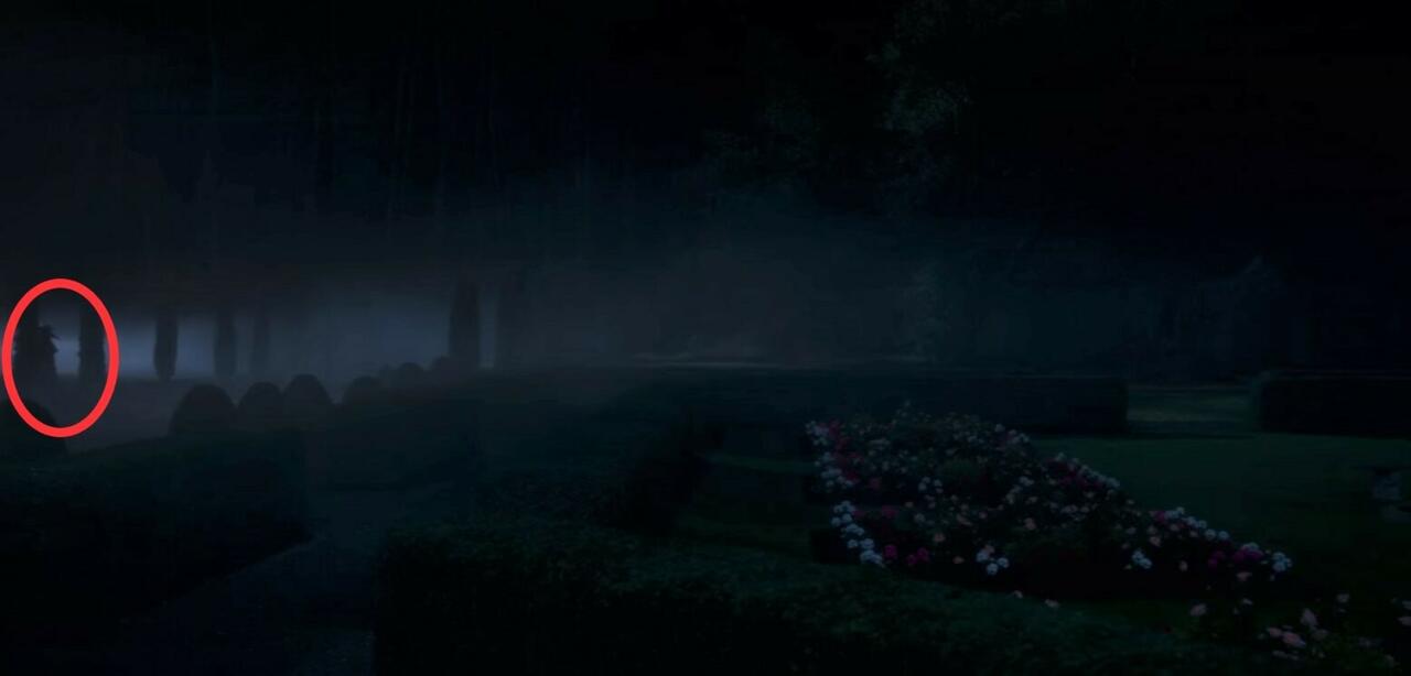20.) Episode 1, 51:03, on the left side of the shot, half-hidden behind one of the talle, slender shrubs as Dani walks o