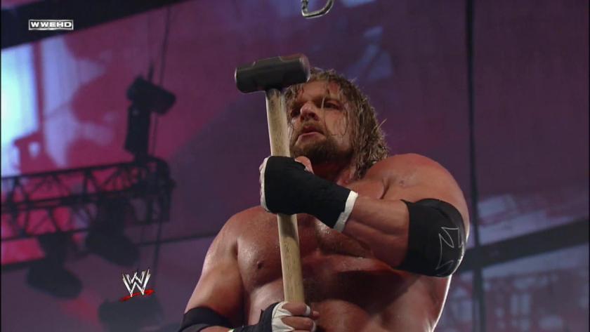 Triple H Swings His Sledgehammer