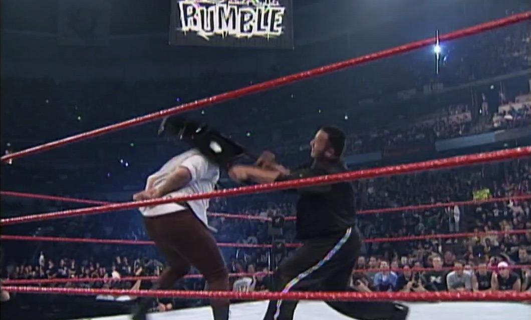 11. The Rock Delivers 11 Unprotected Chair Shots To Mick Foley