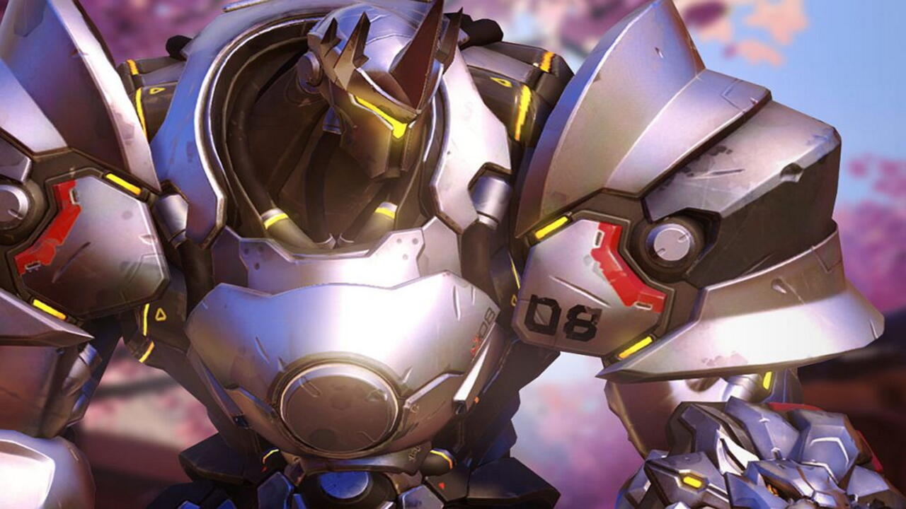 Reinhardt's armor isn't just for show. He can absorb a substantial amount of damage even without his shield up.