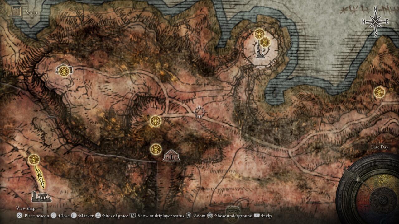 The Dragonbarrow map is located under a placard near a fork in the road, southwest of the Divine Tower of Caelid.