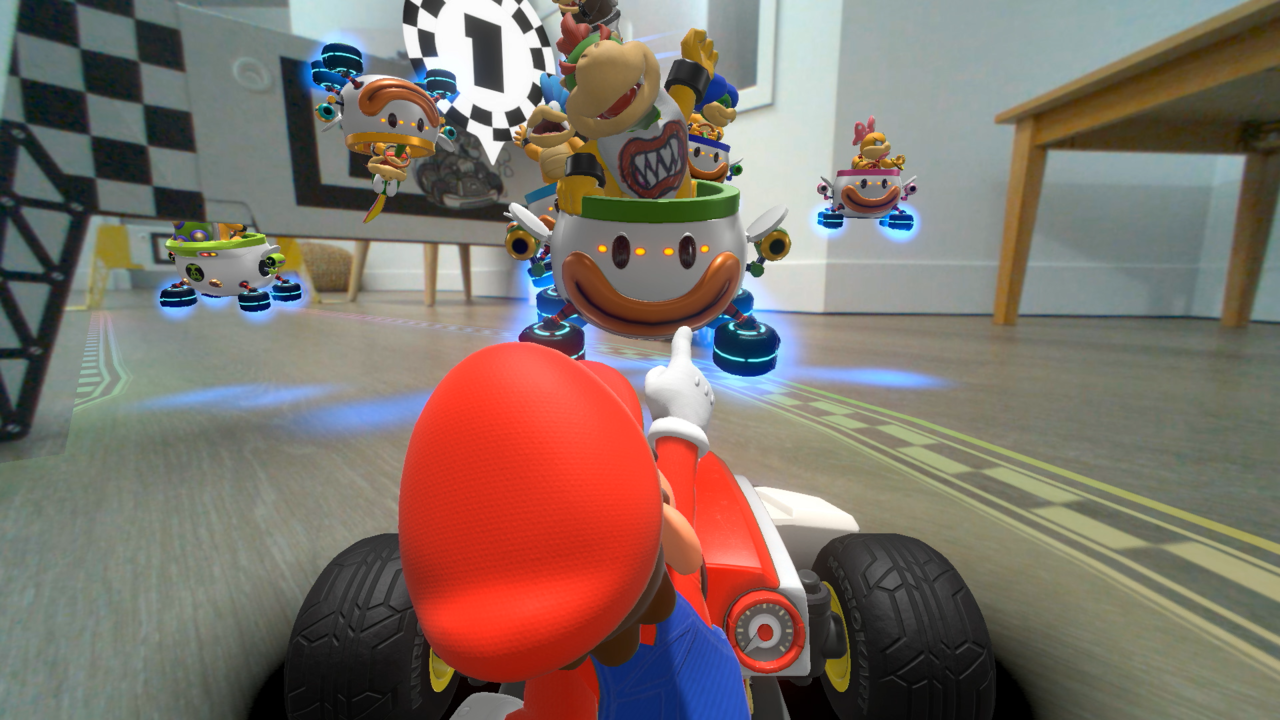Does Mario Kart Tour sync with Mario Kart 8 Deluxe on Nintendo Switch?